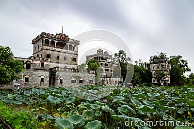 July 2017 â€“ Kaiping, China - Kaiping Diaolou and lotus pond in Zili Village, near Guangzhou. Editorial Stock Photo